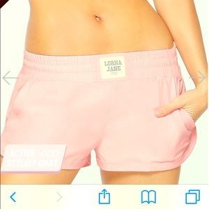 Lorna Jane Bubble gum pink running shorts.